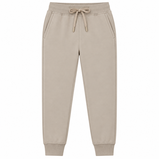 A pair of light beige jogger sweatpants with a matching drawstring waist and ribbed ankle cuffs, shown flat on a white background.