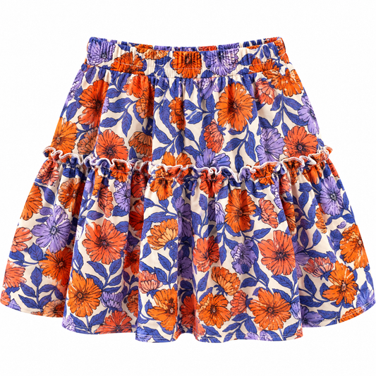 A tiered ruffle skirt with a vibrant floral pattern featuring orange and purple flowers on a cream background.